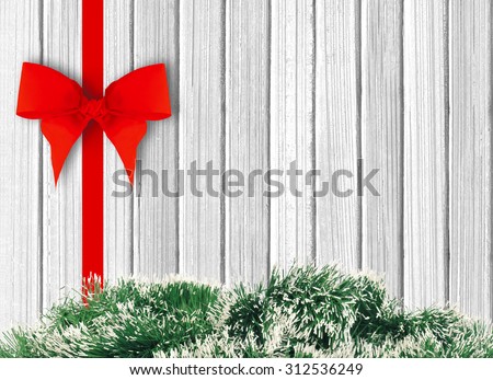 white wooden desk, red ribbon and green tree