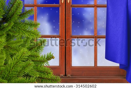 green christmas tree, window and night snow nature background