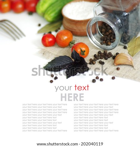 Fresh vegetables (cucumbers and tomatoes) and spices with herbs. Isolated on white background. space for text