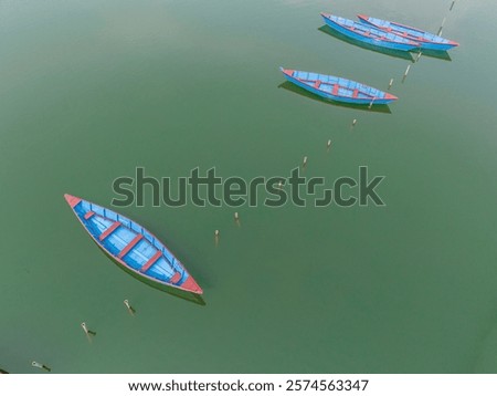 Similar – Image, Stock Photo Boat moored on lakeside in mountains