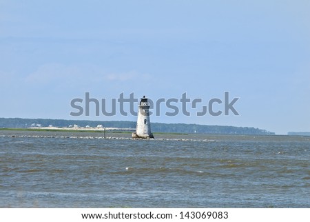 The old Cockspur Island lighthouse as seen from Tybee Island near Savannah, Georgia.