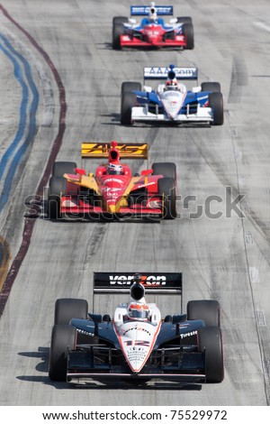 LONG BEACH, CA. - APR 17: Will Power in the #12 car leads a small chase group during the Toyota Grand Prix of Long Beach on April 17, 2011 in Long Beach, CA.