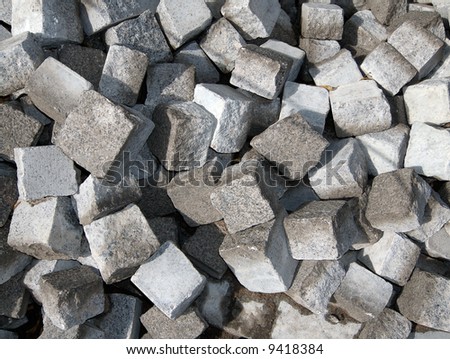 Pile of granite blocks for renewal pavement