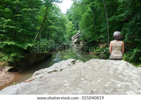 Woman\'s figure  on the  Bell Smith Springs background, Illinois, USA