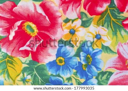 Cloth designed with pink, red, blue, yellow flowers.