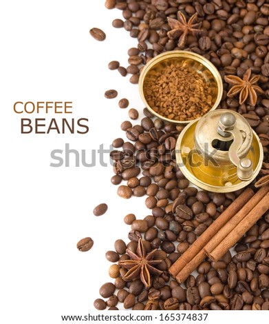 Coffee beans background with spice and coffee-grinder isolated on white background with sample text