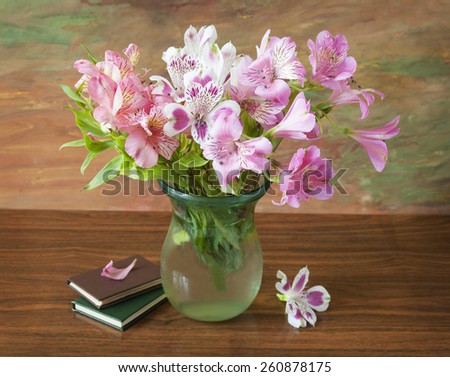 Still life with flowers bunch and  books on artistic background. Teacher\'s day concept