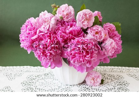 Pink rose and peonies bunch ion artistic background
