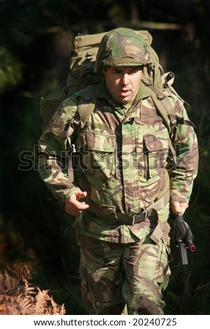 Military physical training, running/march with weapon and backpack