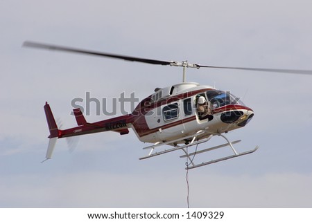 Fire fighting helicopter in flight
