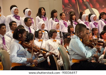 YALA, THAILAND - DECEMBER 2: Unidentified musicians perform for Yala Orchestra Concert in Orchestra Concert for King on Dec 2, 2011 at Meeting Hall Rajabhat University Yala, Thailand