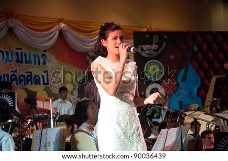 YALA, THAILAND - DECEMBER 2: Unidentified singer performs for Yala Orchestra Concert in Orchestra Concert for King on Dec 2, 2011 at Meeting Hall Rajabhat University Yala, Thailand
