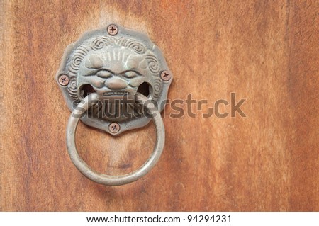 iron lion head door knocking chinese style on wood door