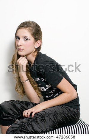 Black and white clothes fashion teenage girl with special eye makeup lashes