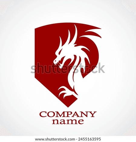 dragon outline on shield red color heraldry logo