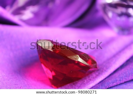 Red ruby on purple cloth
