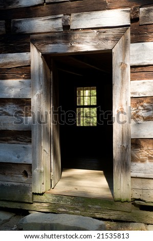 Looking through the door of an old cabin in the hills of tennessee