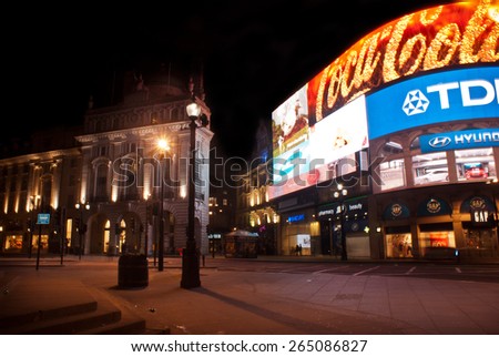 LONDON, ENGLAND APRIL 18: Famous Piccadilly Circus neon signage that has become a major attraction of London on April 18, 2013 in London, United Kingdom.