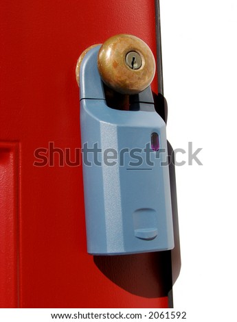 Electronic realtor key holder lock box used for access safety by resale real estate agents on a house door knob