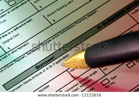 Ink pen over a real estate uniform HUD residential home loan mortgage application with focus on the word borrower