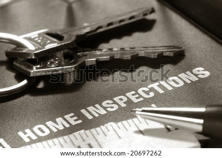 Real estate residential resale home inspection property condition report and inspector engineering checklist folder cover with set of house keys and pen