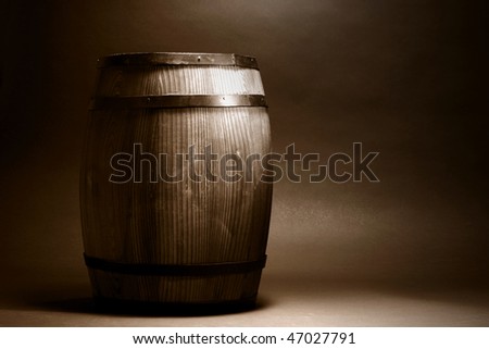 Old antique decorative wood whisky barrel or wine cask in nostalgic sepia