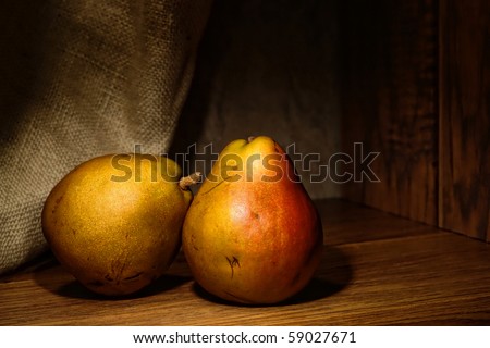Natural organic farm grown pears in traditional vintage style composition artistic photograph style classic still life