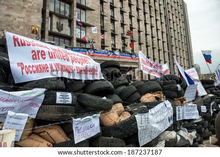 DONETSK, UKRAINE - 14 APRIL 2014: Russian demonstrators protesting and blockade of donetsk goverment during Ukrainian revolution on APRIL 14, 2014 in Donetsk, Ukraine.