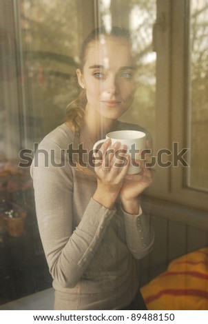 beautiful caucasian woman drinking coffee
