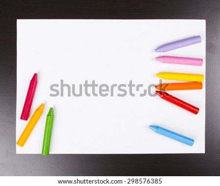 Color pencils crayons on paper background