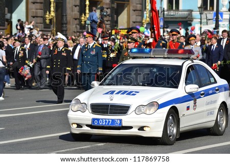 ST.PETERSBURG - MAY 9: Russian police officers guard the demonstration dedicated to the victory in World War II on the Nevsky Prospect, May 9, 2012 in St.Petersburg, Russia.
