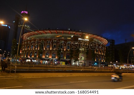 BARCELONA - JUNE 21: View of bullring Arenas de Barcelona at night, Catalonia, Spain on June 21, 2013. Barcelona is the capital of Catalonia and the second largest city in Spain.