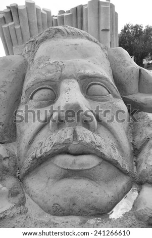 LAPPEENRANTA, FINLAND - AUGUST 21, 2014: Sculpture of man face. Sand Sculpture Festival in Lappeenranta. Black and white.