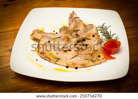 Dish of cooked bacon