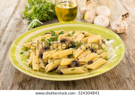 Mushroom Pasta, penne with champignons, Italian Cuisine