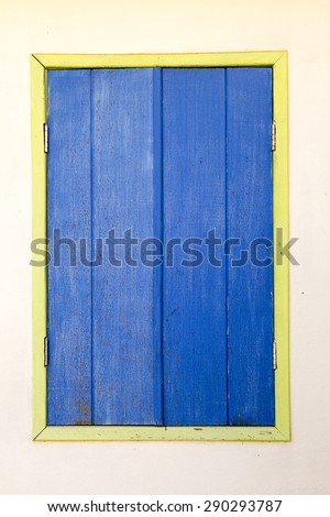 Decorative, colonial, blue, vintage, window on a white wall in Minas Gerais state, Brazil