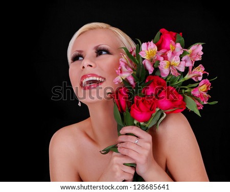 girl with roses, happy young woman with bouquet of flowers over black background, beautiful blonde smiling girl
