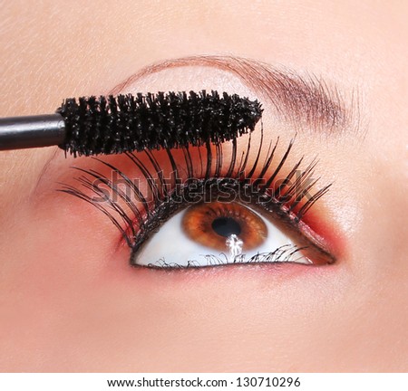 makeup, applying mascara, eye with long eyelashes