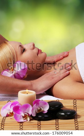 Spa Massage. Beautiful Blonde Woman Getting Body Massage. Outdoor. Beauty Treatments.