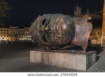 Poland, Krakow - MAY 5: Sculpture Related Eros at the evening market square on May 5, 2015 in Krakow, Poland