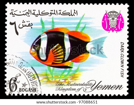 YEMEN - CIRCA 1967: A stamp printed in the Kingdom of Yemen, shows Tropical Fish, Dark clown fish, circa 1967