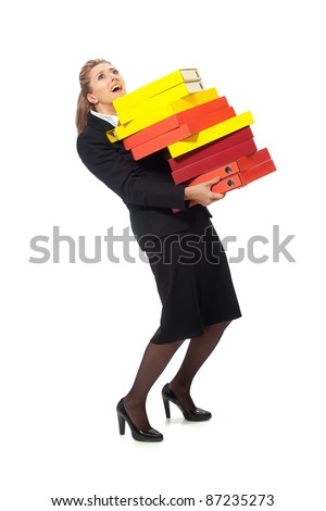 Female office worker carrying heavy stack of files on a white background