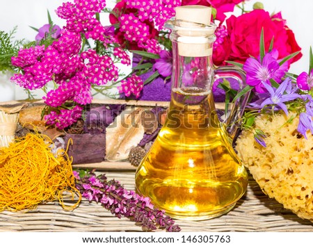 Essential oil with roses and herbs for spa