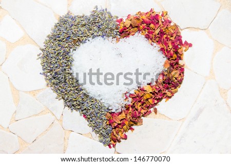 Romantic heart shaped of fragrant dried rose petals and lavender filled with crystallized bath salts to pamper the body and senses