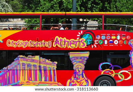 Athens, Greece - May 26, 2013: Tourist is riding City Sightseeing Athens bus to get around Athens city in a sunny day.