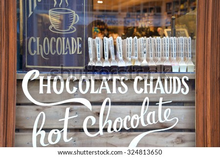 Bruges, Belgium - March 28, 2015: Many hot chocolate shops are easy to find along the street in Bruges, Belgium