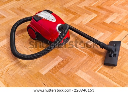 Vacuum cleaner on parquet - technology housework
