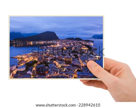 Norway travel photography in hand (Alesund) isolated on white background
