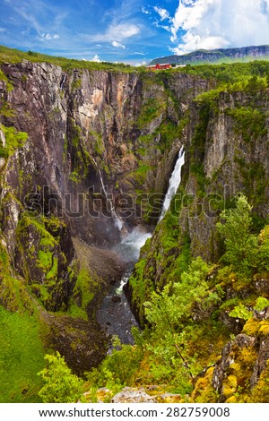 Waterfall Voringfossen in Hardanger Norway - nature and travel background