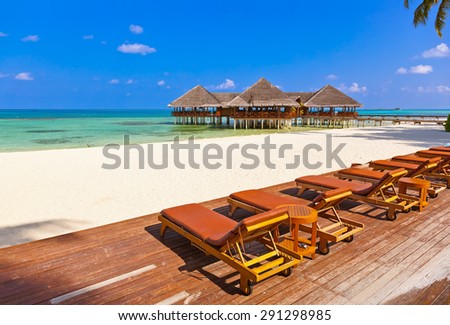 Cafe on tropical Maldives island - nature travel background
